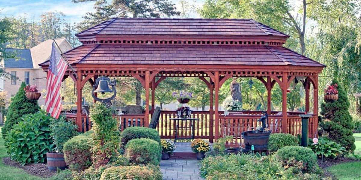 stained oval wooden year round gazebo